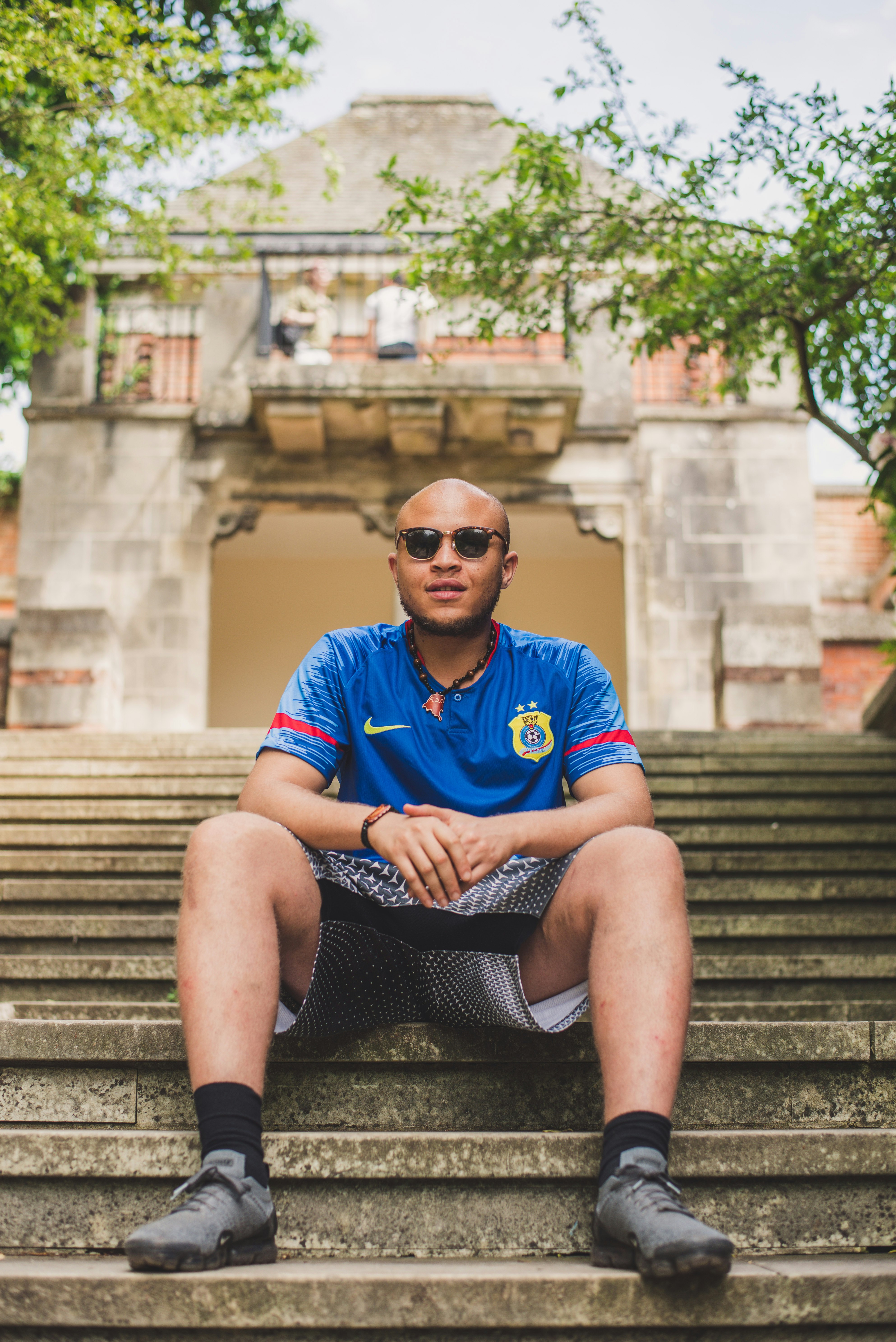 man sitting on stair